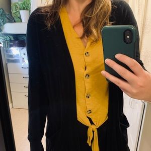 Knee length black sweater with pockets